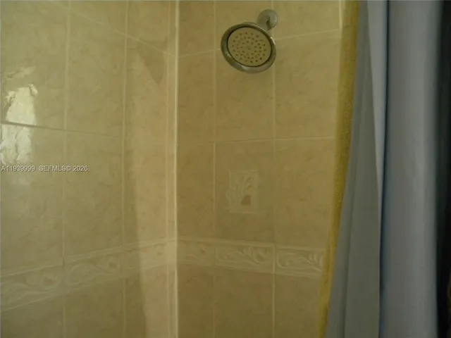 a room with a desk and a window