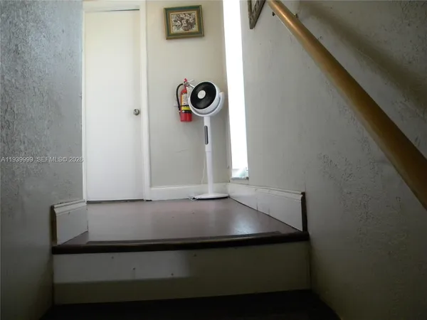 a front view of a livingroom with furniture