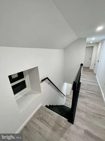 a view of a livingroom with wooden floor