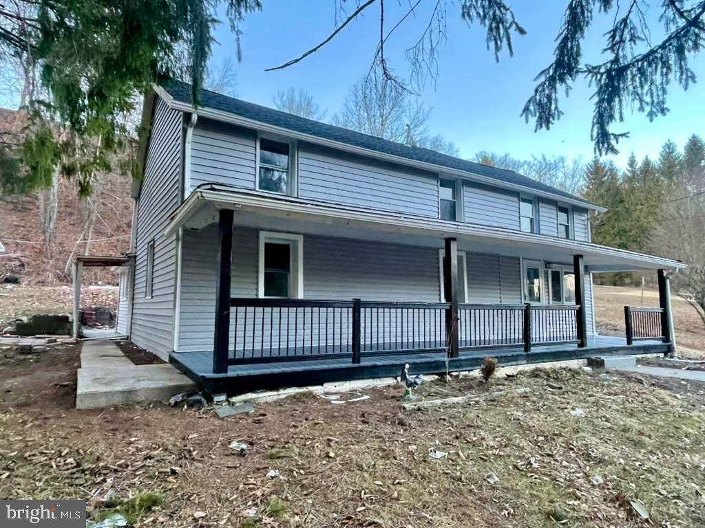 131 Schaeffer Hill Road Pottsville, PA 17901 - Photo 2 of 18 a front view of a house with a yard