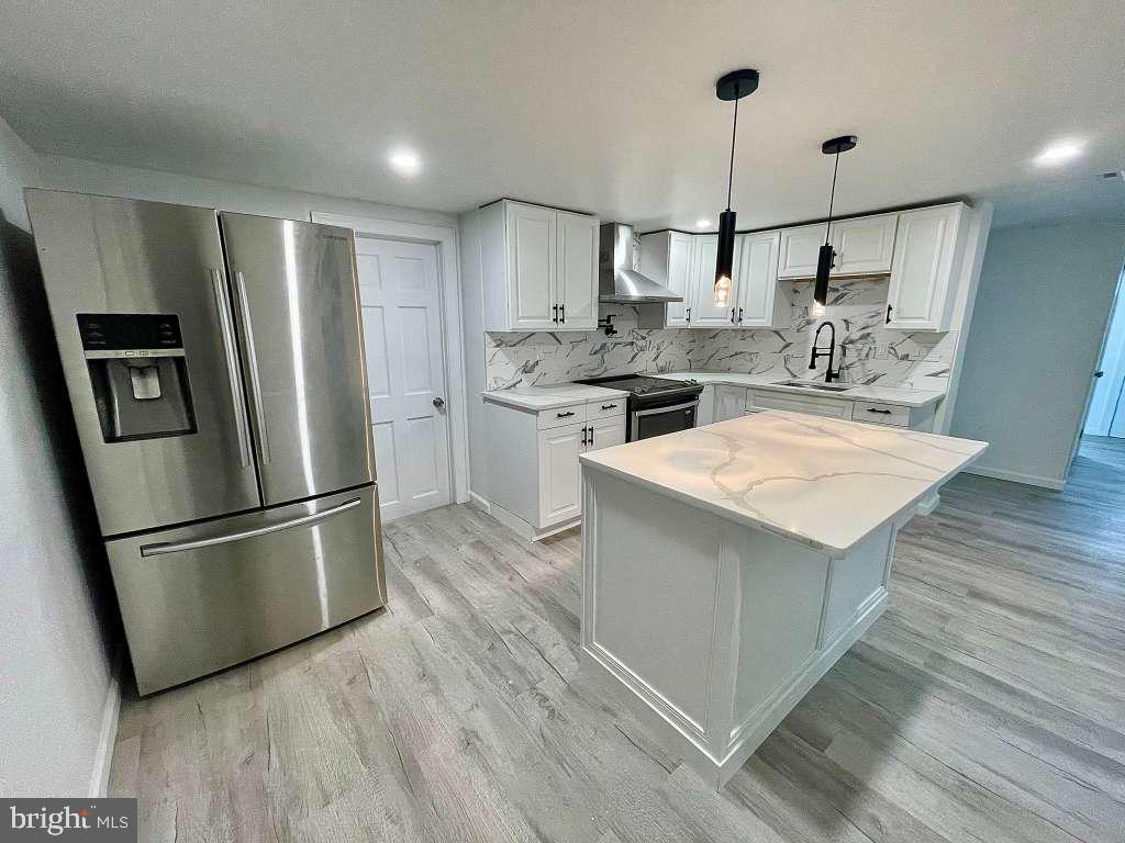 131 Schaeffer Hill Road Pottsville, PA 17901 - Photo 8 of 18 a kitchen with a refrigerator a sink and dishwasher