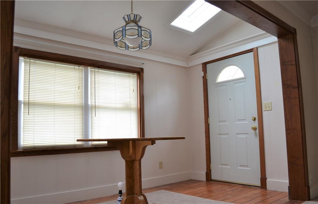 314 Main Street Richeyville, PA 15358 - Photo 11 of 25 Front entry recently used as a dining area has hardwood flooring and twin skylights and is open to the living room.