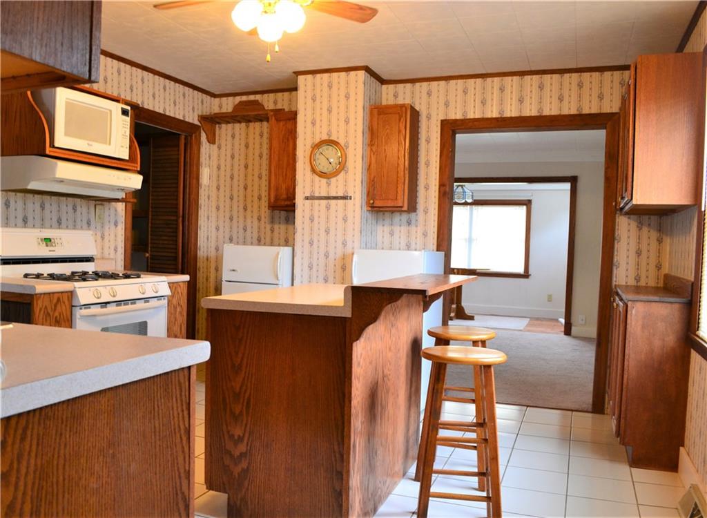 314 Main Street Richeyville, PA 15358 - Photo 15 of 25 The kitchen island is a great spot to enjoy breakfast or whip up a batch of cookies.