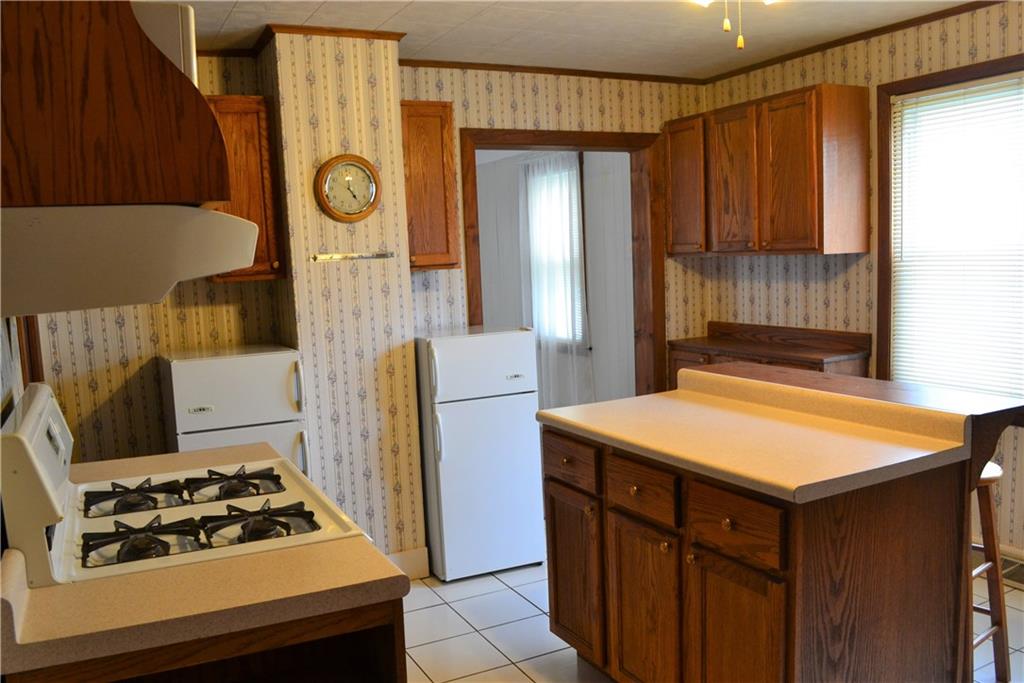 314 Main Street Richeyville, PA 15358 - Photo 17 of 25 The equipped kitchen includes a gas stove and twin compact refrigerators