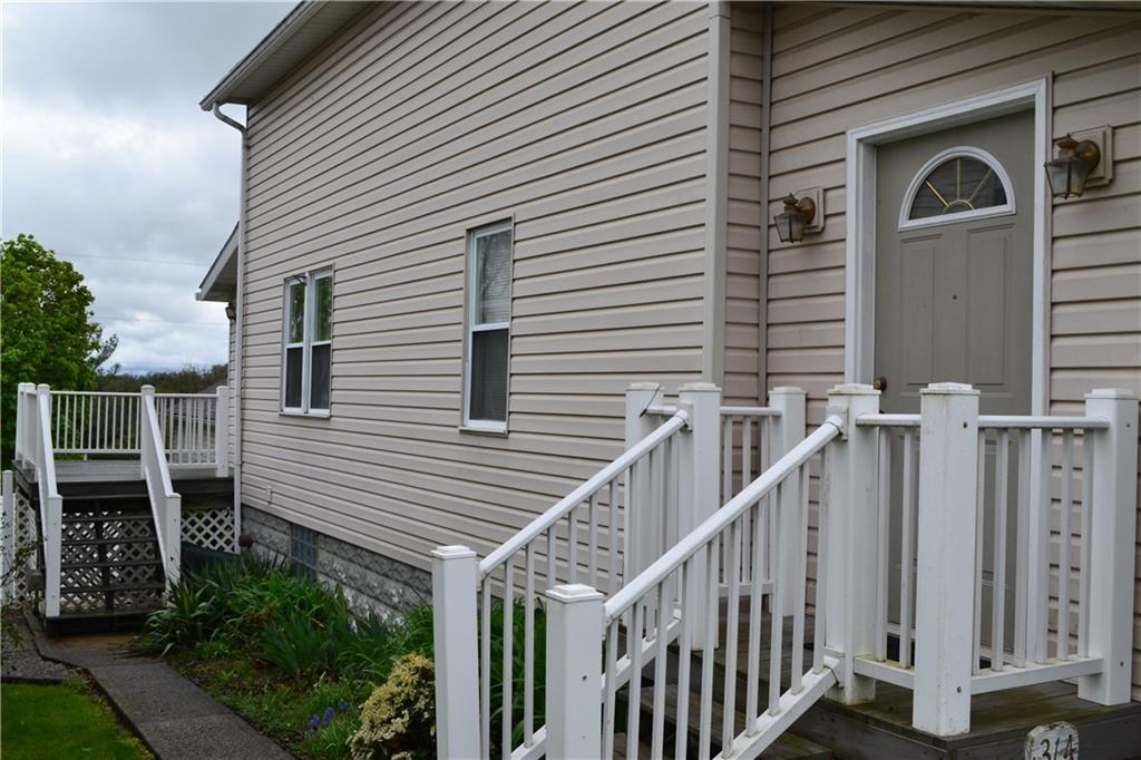 314 Main Street Richeyville, PA 15358 - Photo 3 of 25 Steps on the left access the rear deck with entry to the kitchen.