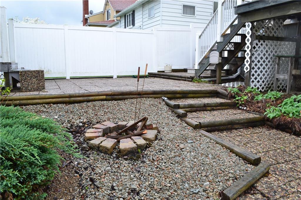 314 Main Street Richeyville, PA 15358 - Photo 23 of 25 The tiered rear yard even has a fire pit ready for a s'mores party!