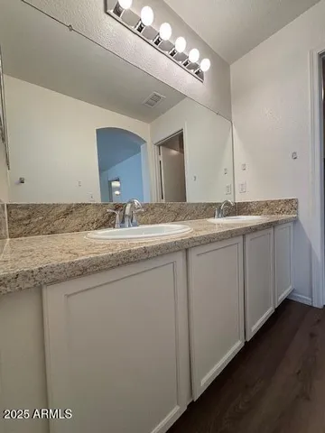 a view of a livingroom with wooden floor