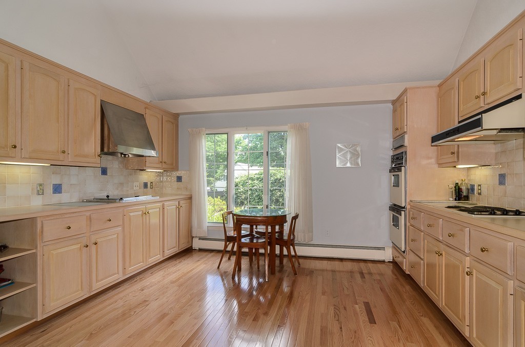 22 Cranmore Road Wellesley, MA 02481 - Photo 11 of 22 a kitchen with sink cabinets and wooden floor