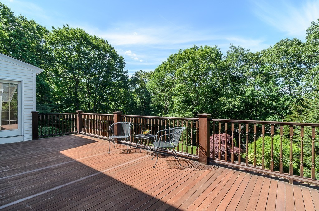 22 Cranmore Road Wellesley, MA 02481 - Photo 3 of 22 a balcony with wooden floor and fence