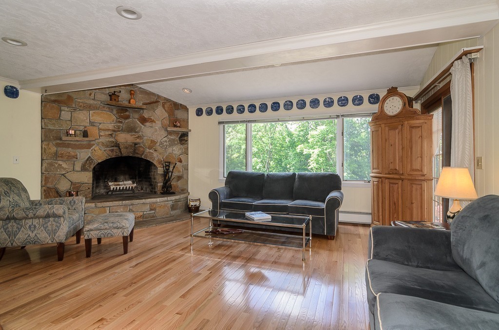 22 Cranmore Road Wellesley, MA 02481 - Photo 9 of 22 a living room with furniture and a fireplace