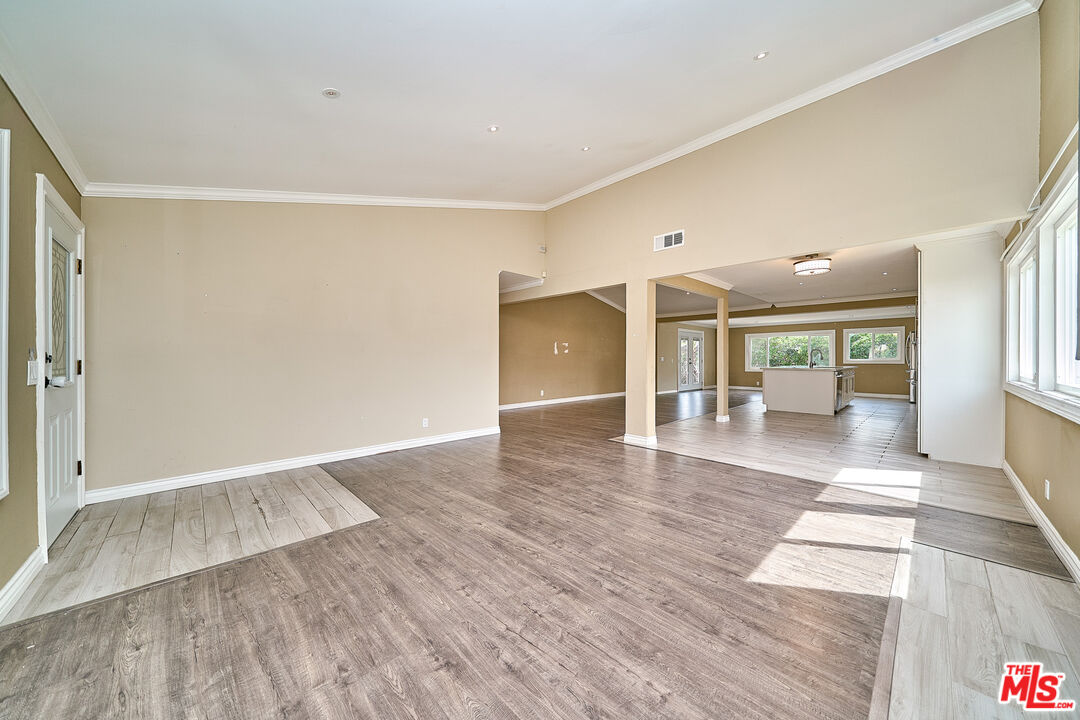 2660 Conata Street Duarte, CA 91010 - Photo 13 of 64 an empty room with wooden floor and windows
