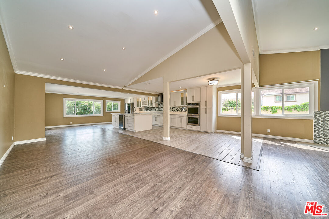 2660 Conata Street Duarte, CA 91010 - Photo 17 of 64 a view of empty room with wooden floor and fireplace