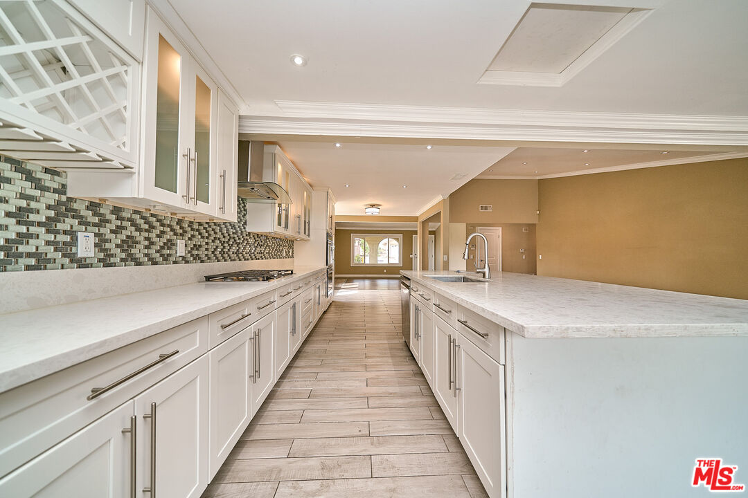 2660 Conata Street Duarte, CA 91010 - Photo 22 of 64 a large kitchen with a stove and large window