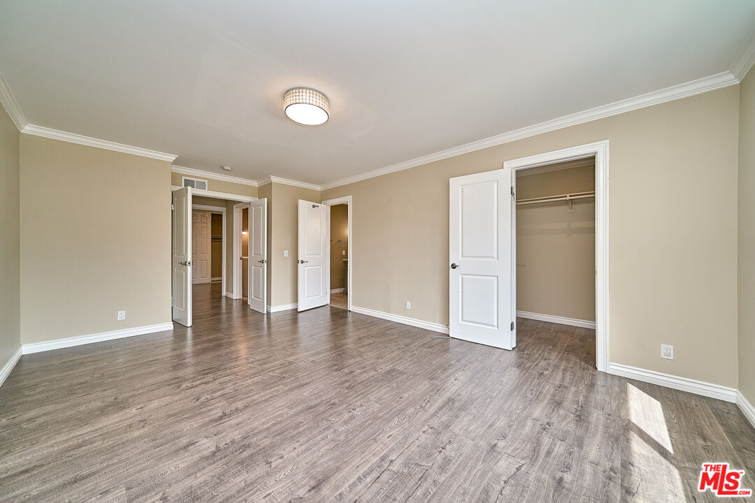 2660 Conata Street Duarte, CA 91010 - Photo 29 of 64 a view of an empty room with wooden floor and closet