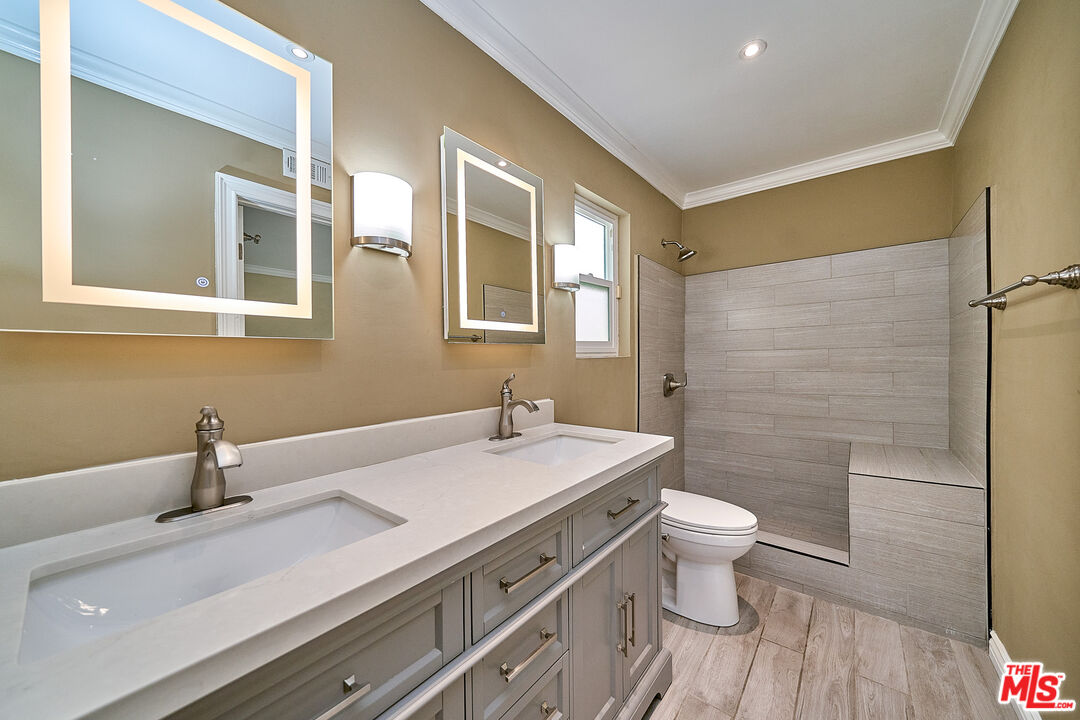 2660 Conata Street Duarte, CA 91010 - Photo 31 of 64 a bathroom with a sink and a mirror