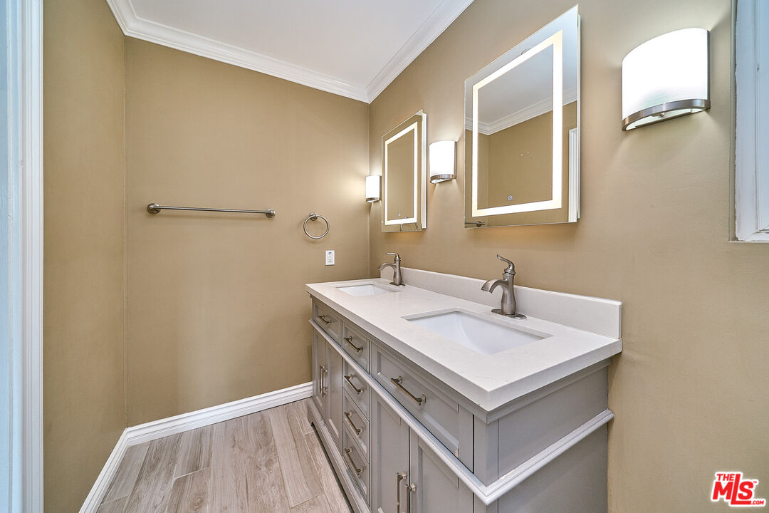 2660 Conata Street Duarte, CA 91010 - Photo 32 of 64 a bathroom with a sink and mirror