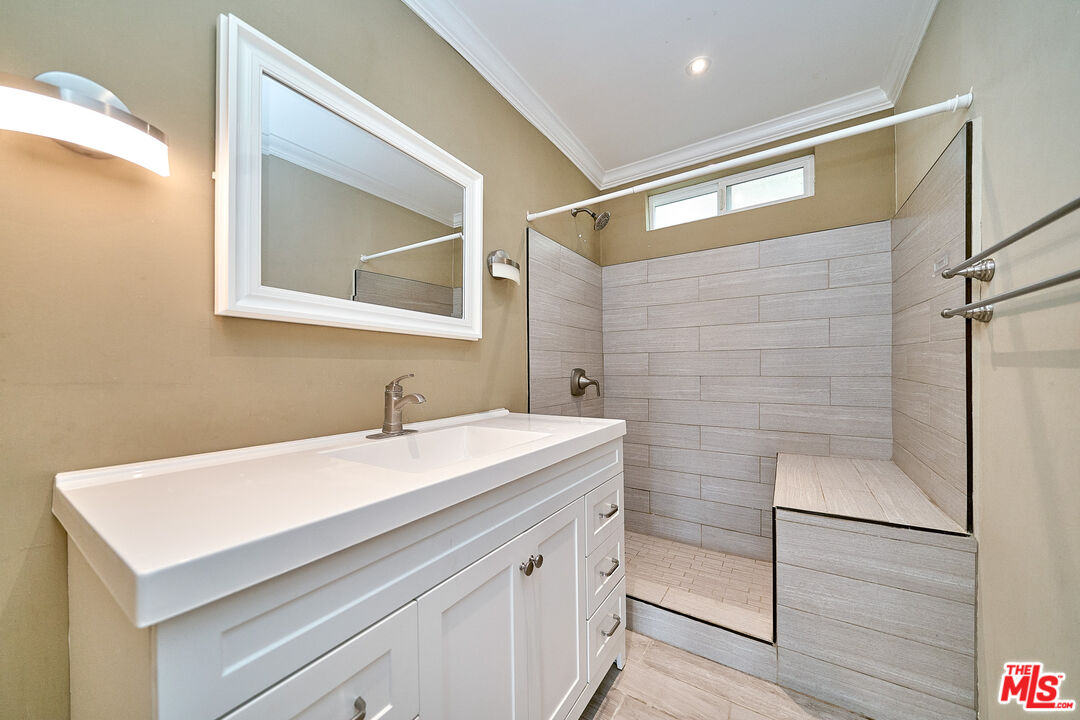 2660 Conata Street Duarte, CA 91010 - Photo 33 of 64 a bathroom with a sink and a mirror