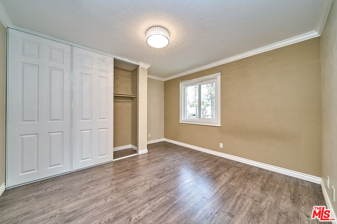 2660 Conata Street Duarte, CA 91010 - Photo 34 of 64 an empty room with wooden floor and windows