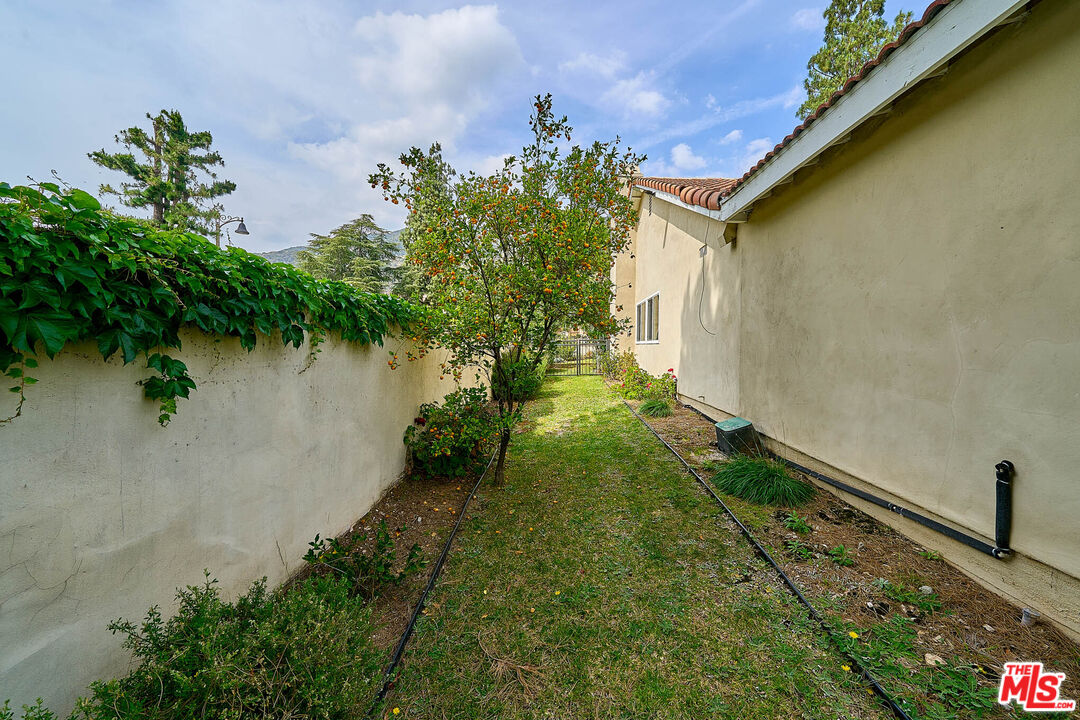 2660 Conata Street Duarte, CA 91010 - Photo 44 of 64 a backyard of a house with a yard and outdoor seating