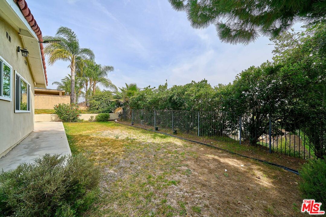 2660 Conata Street Duarte, CA 91010 - Photo 45 of 64 a view of a yard with plants and a fountain