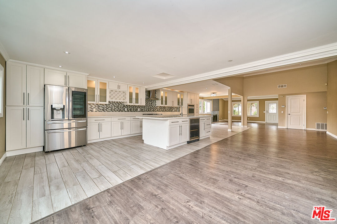 2660 Conata Street Duarte, CA 91010 - Photo 48 of 64 a kitchen with wooden floors and white appliances