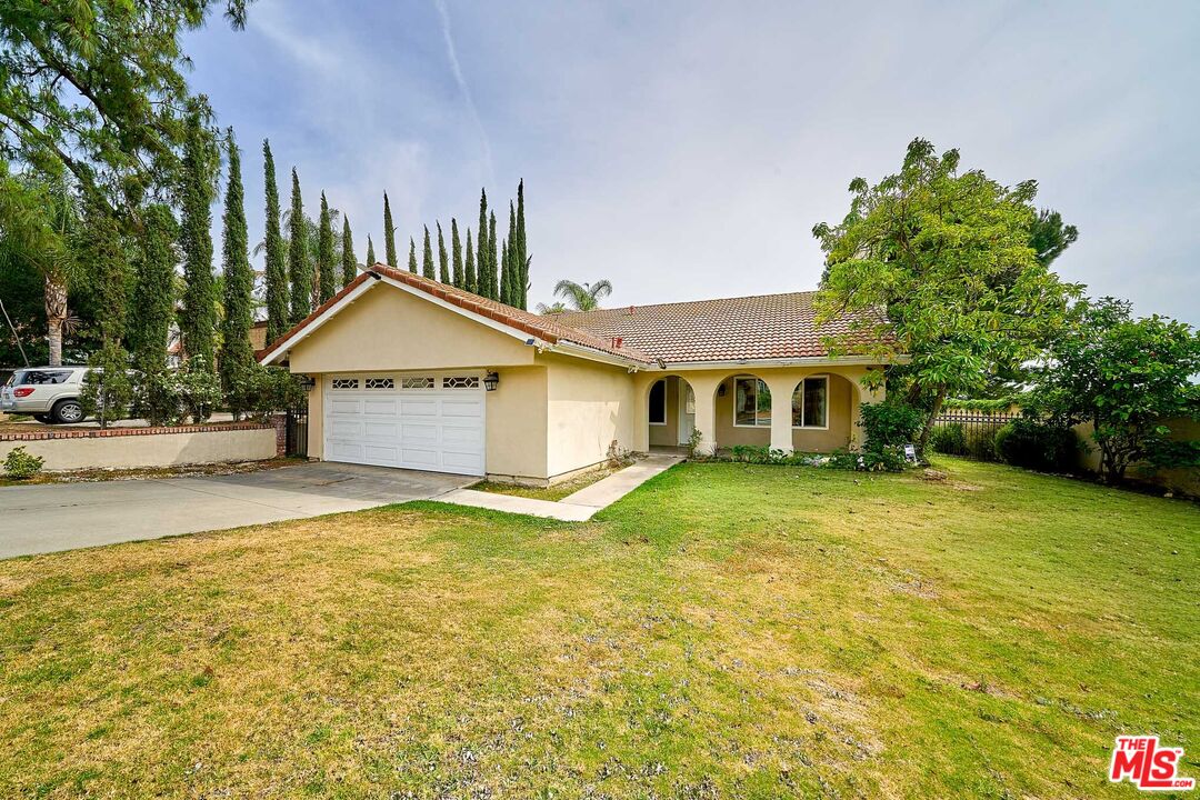 2660 Conata Street Duarte, CA 91010 - Photo 55 of 64 a front view of a house with yard and tree