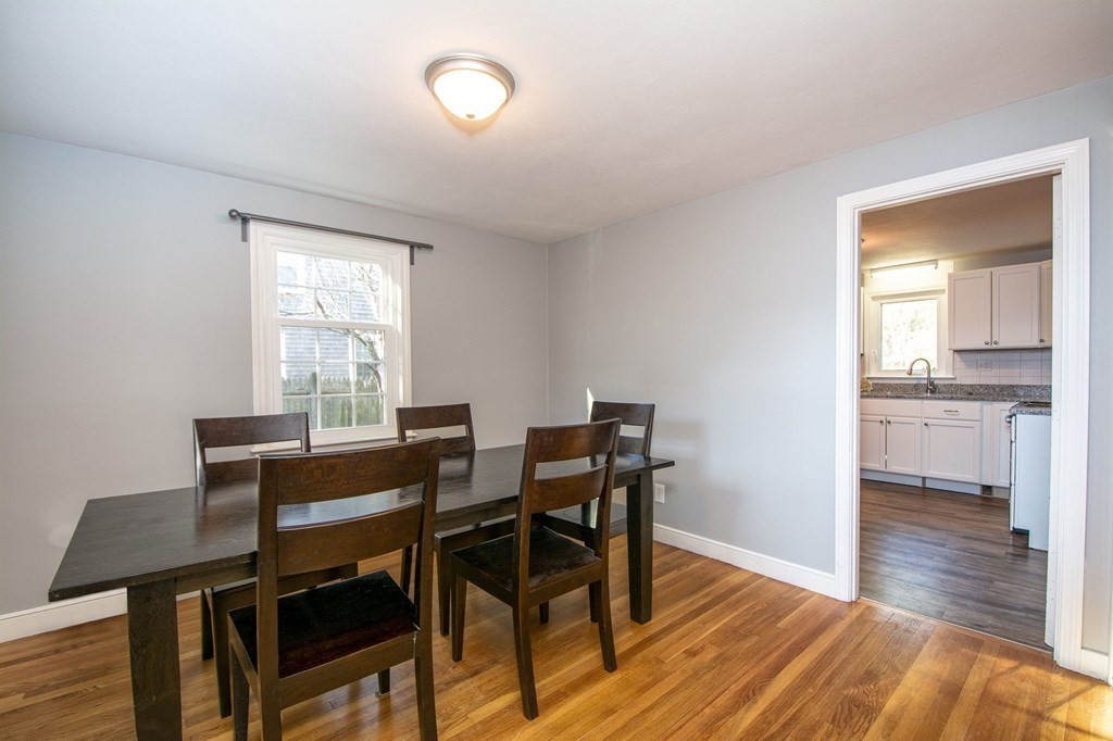 226 Beaver Dam Road Scituate, MA 02066 - Photo 3 of 12 a view of a dining room with furniture and wooden floor