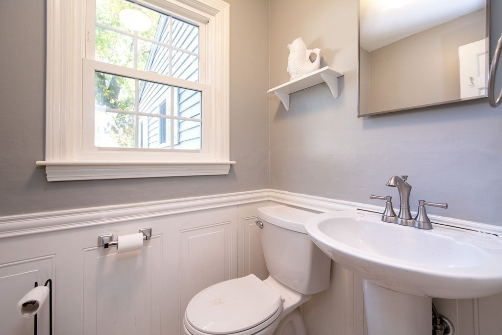 226 Beaver Dam Road Scituate, MA 02066 - Photo 7 of 12 a bathroom with a sink and a toilet