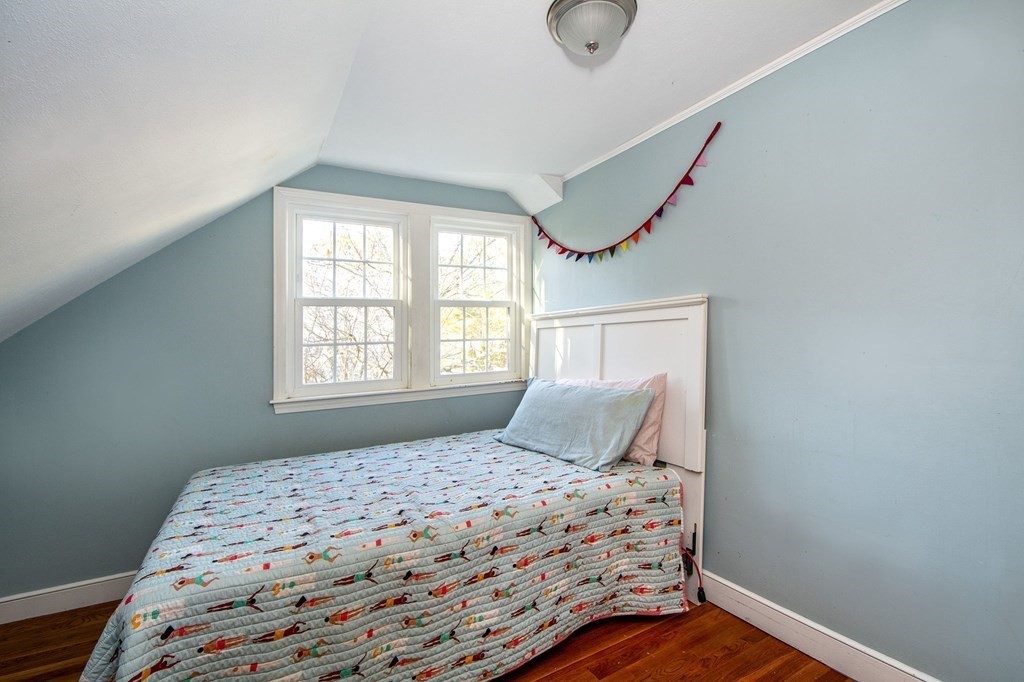 226 Beaver Dam Road Scituate, MA 02066 - Photo 9 of 12 a bedroom with a bed and a window