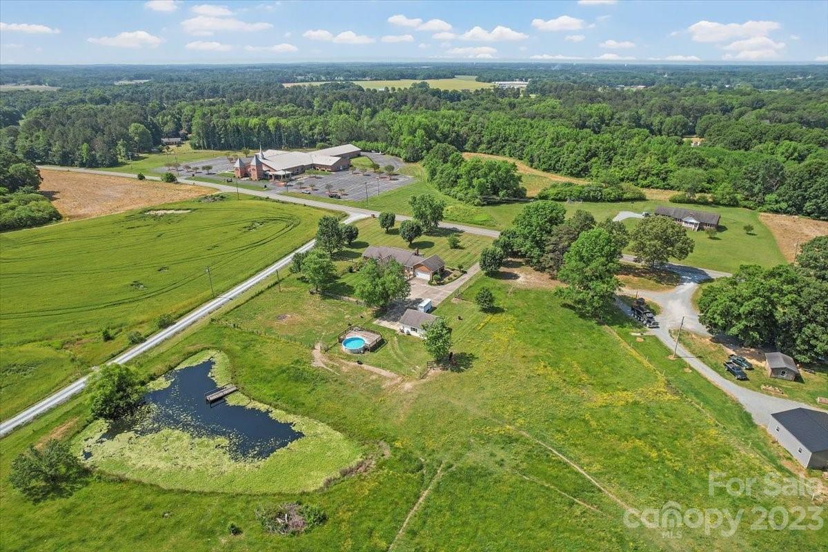 425 Baucom Road Monroe, NC 28110 - Photo 13 of 48 a view of a lake with a yard