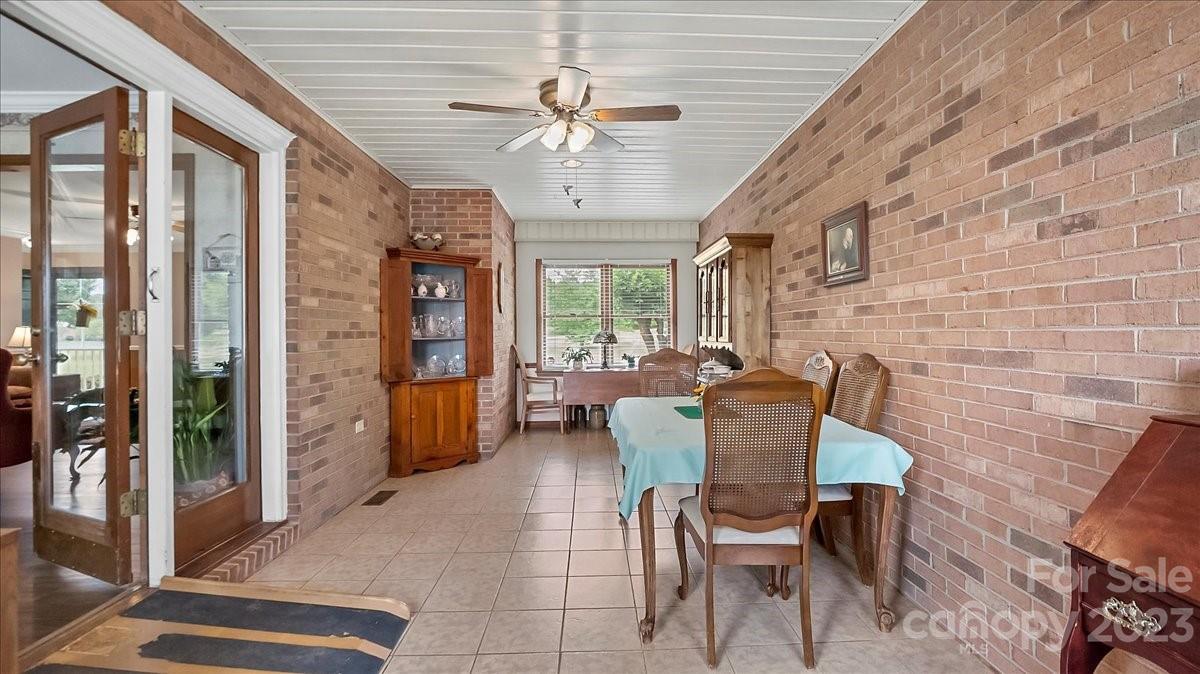 425 Baucom Road Monroe, NC 28110 - Photo 20 of 48 a dining room with furniture and window