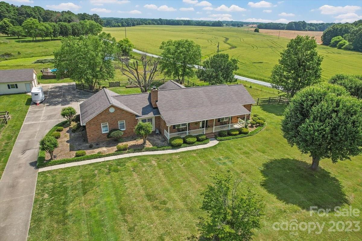 425 Baucom Road Monroe, NC 28110 - Photo 41 of 48 an aerial view of a house with a garden