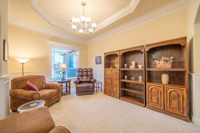 a kitchen with stainless steel appliances granite countertop a sink and cabinets
