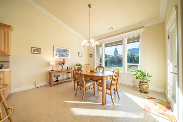 a view of workspace with furniture and windows