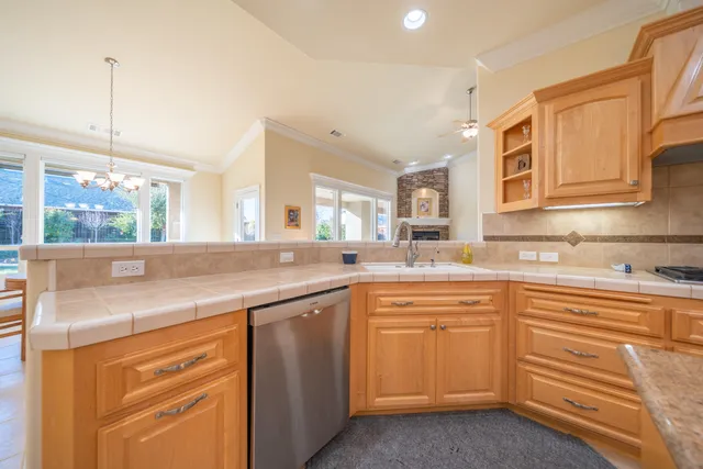 a view of a patio with a table chairs and a table