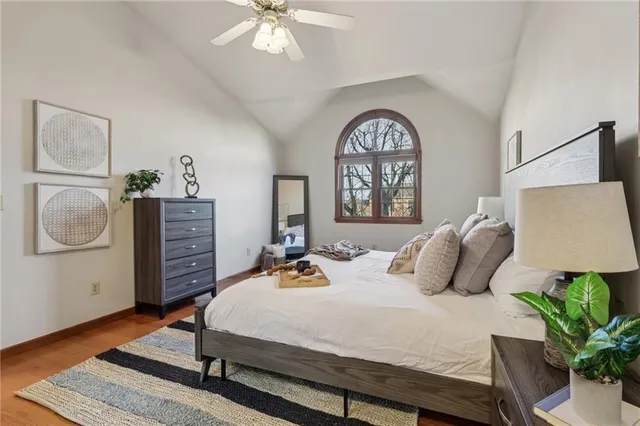 a view of balcony with wooden floor and fence