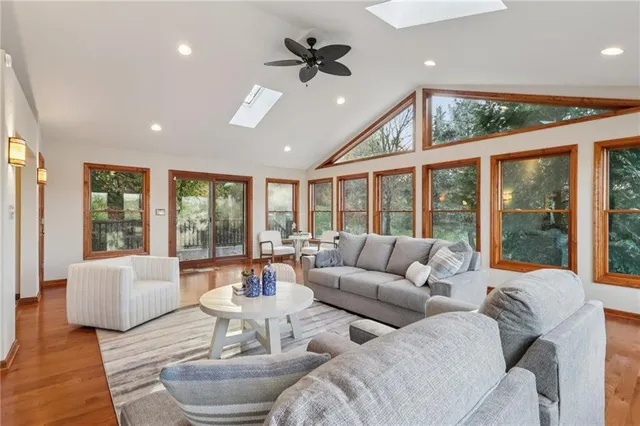 a view of a livingroom with furniture and wooden floor