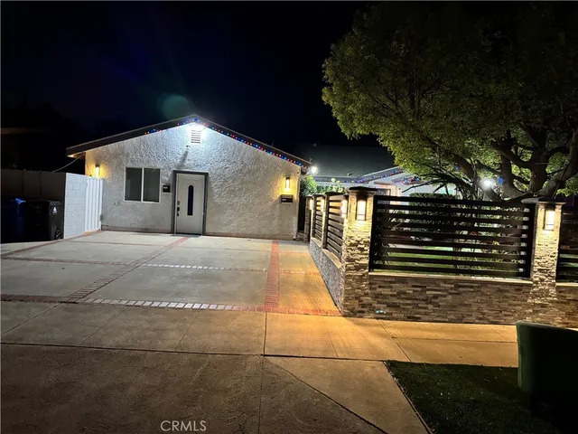 a view of a house with a street