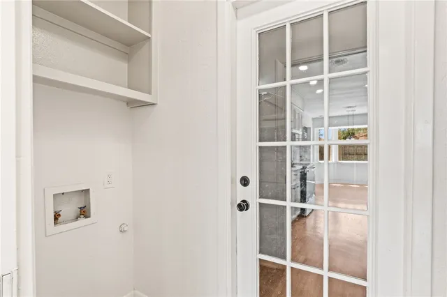 a view of a room with rack on the wall