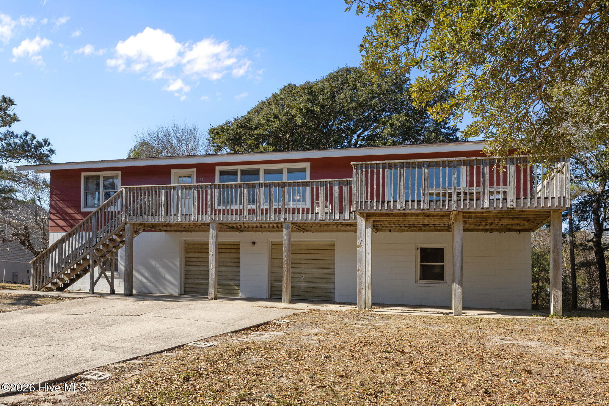 103 Yaupon Road Pine Knoll Shores, NC 28512 - Photo 4 of 58 Curb Side View