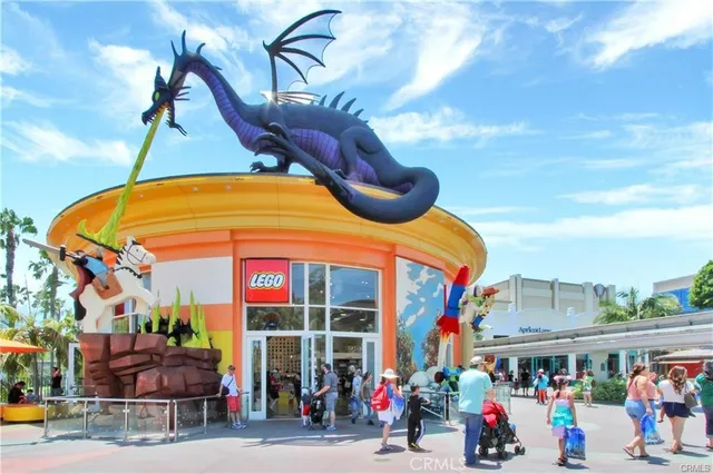 a view of a street with stores