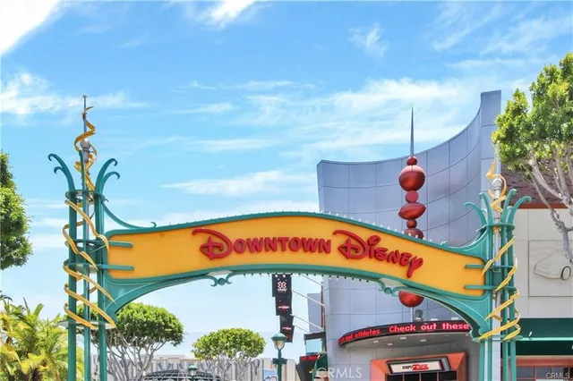a group of people sitting in front of store