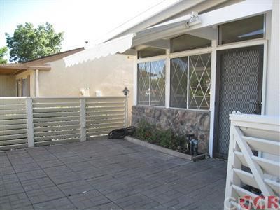 1731 Westfield Road Paso Robles, CA 93446 - Photo 1 of 1 Nice front patio to enjoy your morning coffee on. The 2 car garage is finished with newer roll up garage door and built in extra storage.