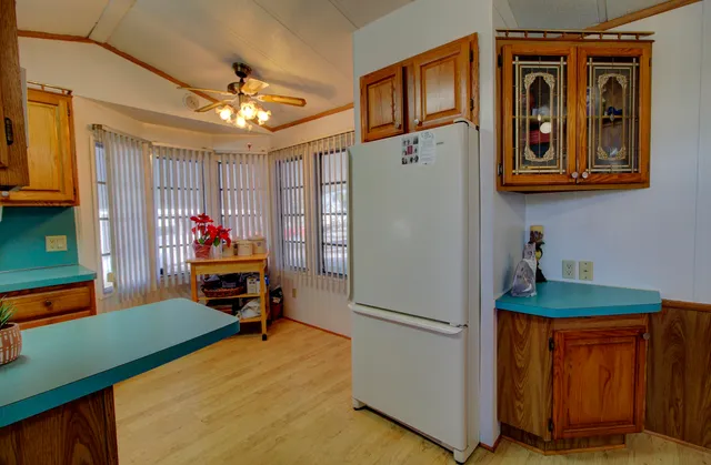 a play room with furniture and a chandelier