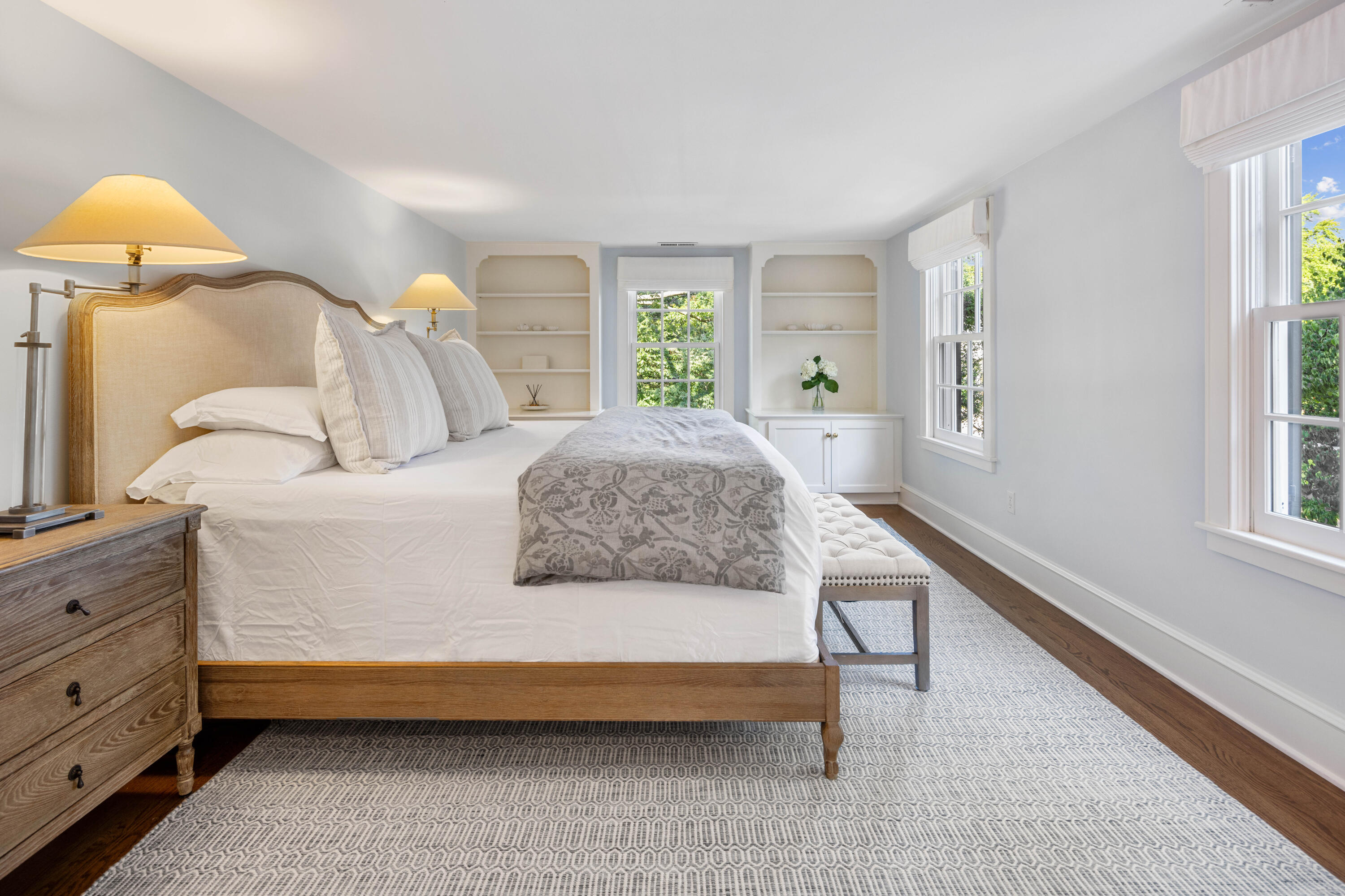 7 Berry Lane Darien, CT 06820 - Photo 17 of 27 a spacious bedroom with a bed and a dresser