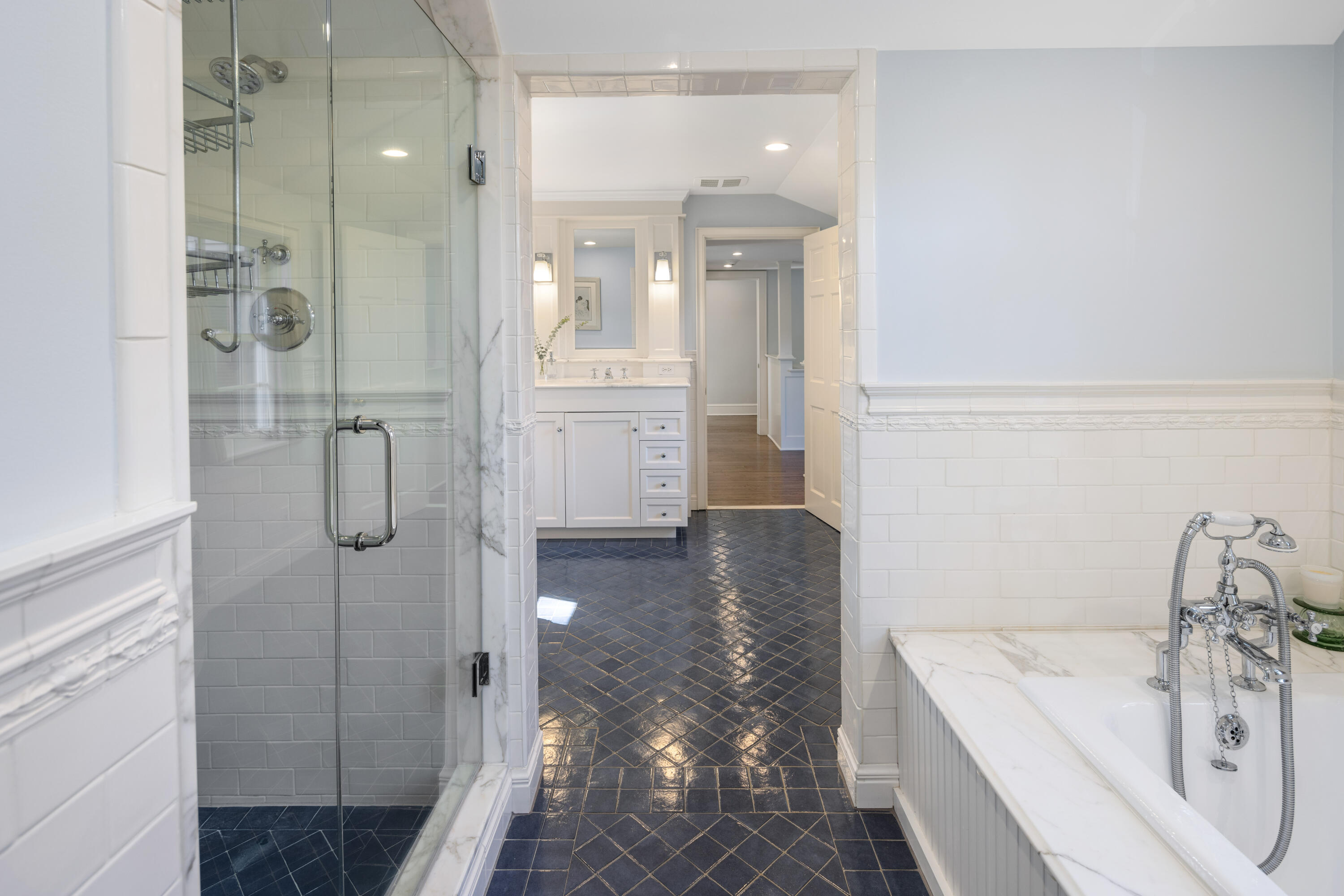 7 Berry Lane Darien, CT 06820 - Photo 18 of 27 a bathroom with a shower sink and mirror