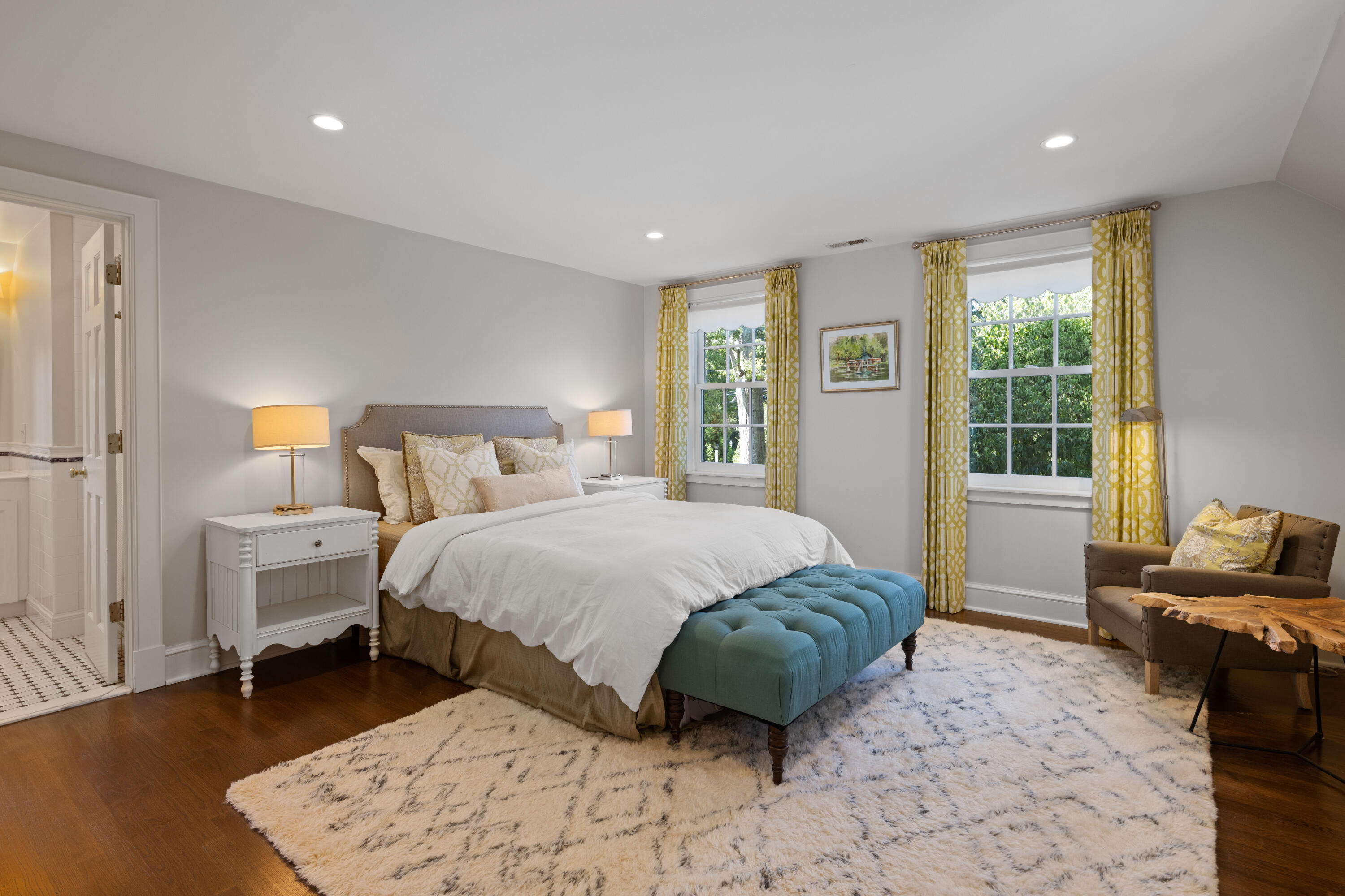 7 Berry Lane Darien, CT 06820 - Photo 23 of 27 a bedroom with a bed and wooden floor