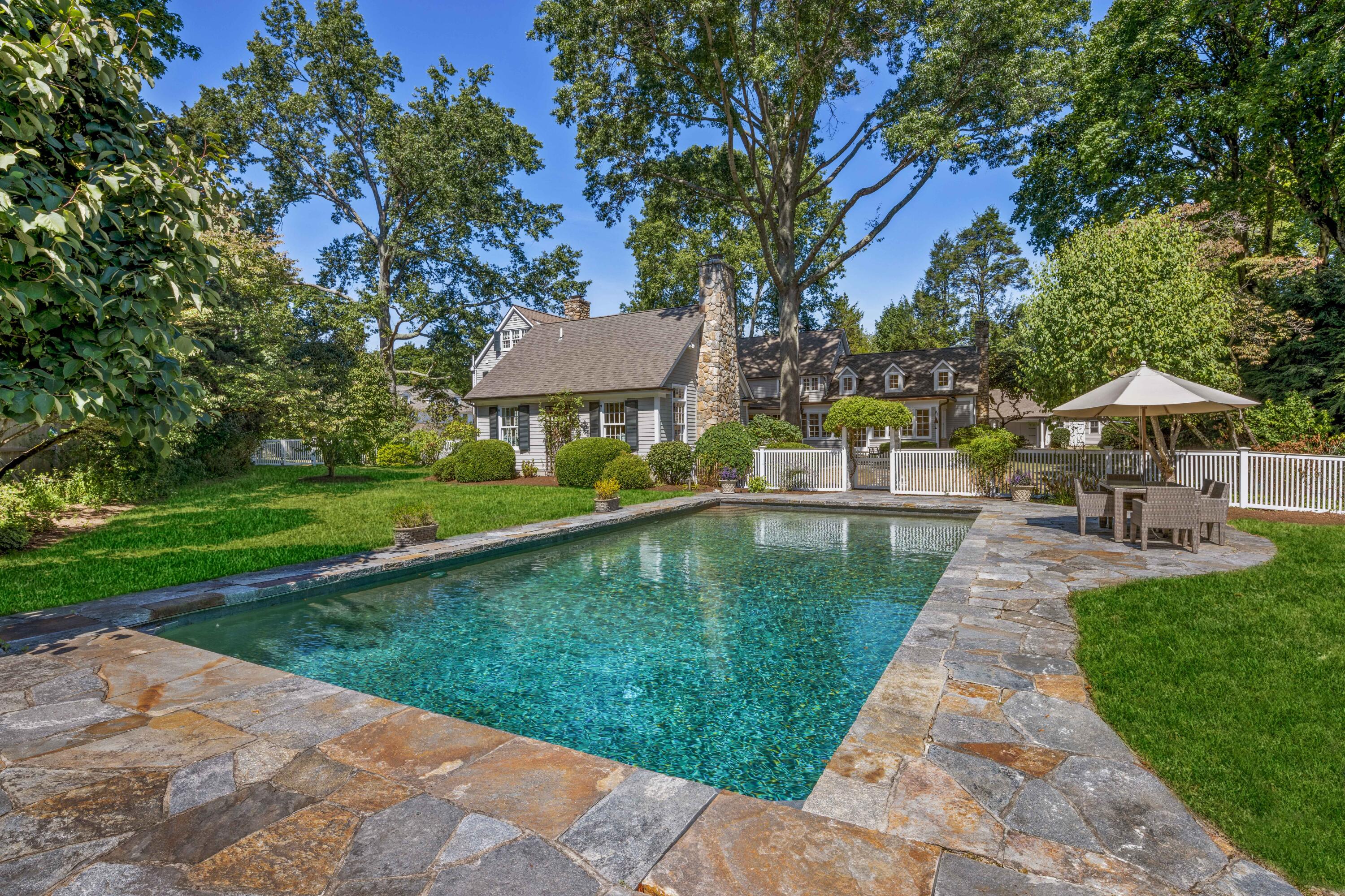 7 Berry Lane Darien, CT 06820 - Photo 24 of 27 a view of a backyard with swimming pool