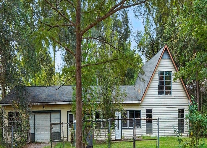 front view of house with a small yard