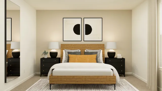 a bedroom with a bed and a table